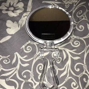 Double sided hand mirror